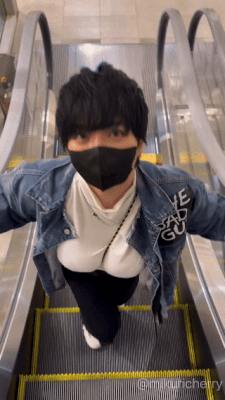 1girl animated animated_gif black_hair black_pants bouncing_breasts breasts denim denim_jacket jacket large_breasts mask mikuricherry mouth_mask pants real_life short_hair tomboy