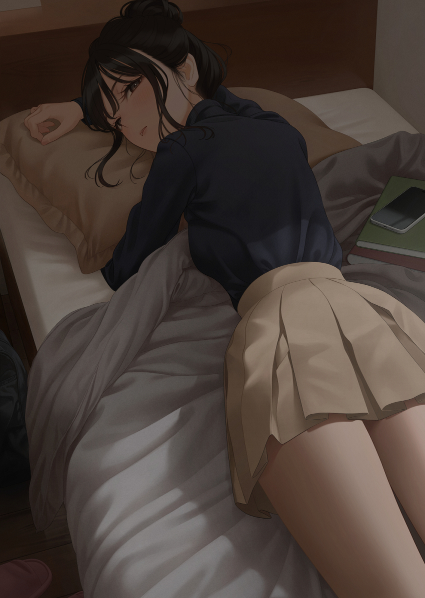 1girl ass bed bed_sheet black_hair black_shirt book brown_skirt cellphone commentary_request head_on_pillow highres hugging_object long_sleeves looking_at_viewer looking_back lying on_bed on_stomach original phone pillow pillow_hug shirt skirt smartphone solo thighs yukishima_momo