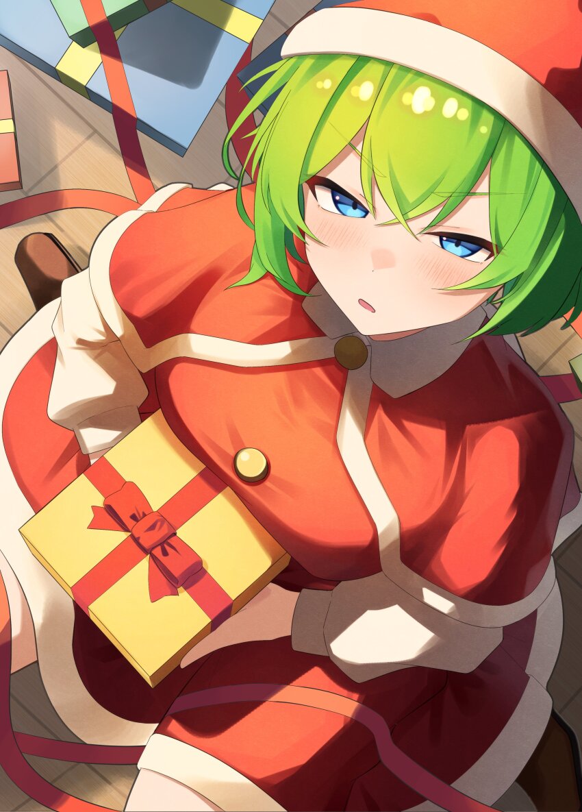 1girl absurdres asymmetrical_hair blue_eyes blush box breasts capelet commentary from_above gift gift_box green_hair hat highres holding holding_gift long_sleeves looking_at_viewer open_mouth raian_macaroni red_capelet red_hat santa_costume shiki_eiki short_hair sitting solo touhou v-shaped_eyebrows