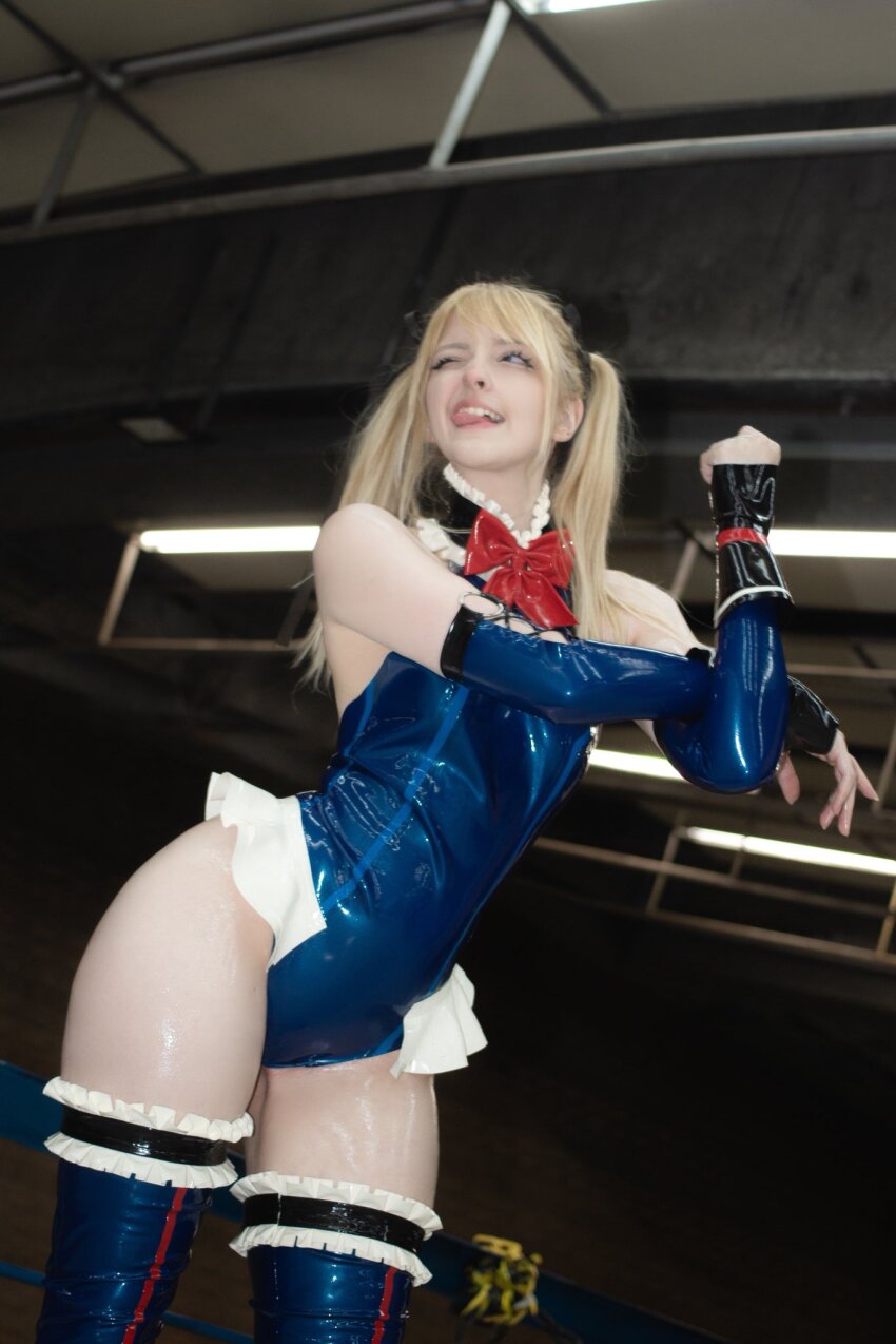 1girl ass blonde_hair brazilian_(nationality) breasts cosplay curvy dead_or_alive dutch_angle elbow_gloves feet gloves highleg highleg_one-piece_swimsuit highres leotard long_hair looking_back looking_to_the_side marie_rose marie_rose_(cosplay) memepantazis naughty_face one-piece_swimsuit one_eye_closed photo_(medium) real_life shiny_skin smile stretching swimsuit tongue tongue_out twintails wide_hips zipper