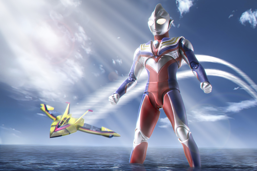 1boy absurdres aircraft airplane alien armor blue_sky breastplate clenched_hands cloud cloudy_sky color_timer colored_skin commentary compound_eyes contrail crystal day diffraction_spikes dorsal_fin fighter_jet figure_(medium) forehead_jewel giant giant_male glowing glowing_eyes guts_wing highres horizon legs_apart looking_ahead love894anon male_focus military_vehicle multicolored_skin no_pupils ocean outdoors pectorals photo_(medium) purple_skin red_skin sh_figuarts silver_skin sky solo standing tokusatsu toned toned_male ultra_series ultraman_tiga ultraman_tiga_(multi_type) ultraman_tiga_(series) wading white_eyes wrinkled_skin