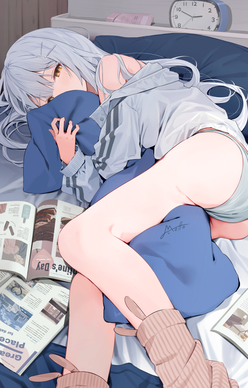 1girl artist_name ass ass_focus bed bedroom blush clock closed_mouth commentary_request hair_ornament hairclip highres hugging_object indoors jacket long_hair looking_at_viewer lying magazine_(object) motto_(night_wear) on_bed on_side original panties pillow pillow_hug socks solo thighs underwear very_long_hair white_hair white_jacket white_panties yellow_eyes